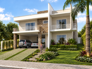 Fachada de residência contemporânea com dois pavimentos, revestimento em pedra natural, varandas, garagem coberta e amplo paisagismo frontal.